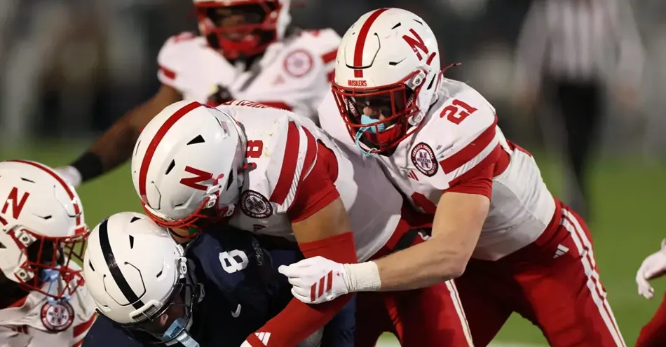 Huskers Bested in State College