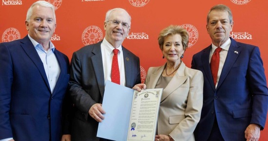 NU Regent Tim Clare, President Jeffrey P. Gold, M.D., U.S. Secretary of Education Linda McMahon and Nebraska Governor Jim Pillen with a proclamation recognizing joint accreditation between UNL and UNMC as a significant step forward for Nebraska.  (Photo: Jordan Opp, UNL University Communication and Marketing)