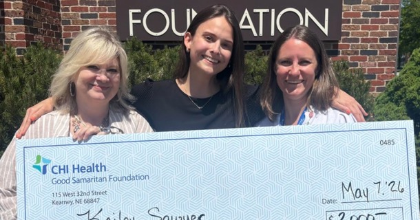  Kailey Sawyer (center) celebrates receiving $2,000 in Good Samaritan Foundation Health Care Scholarships alongside Care Management colleagues Melissa Murphy (left) and Abby Olson (right). Sawyer is among 20 students awarded a collective $18,750 in scholarships this year funded by the Foundation's generous donors.