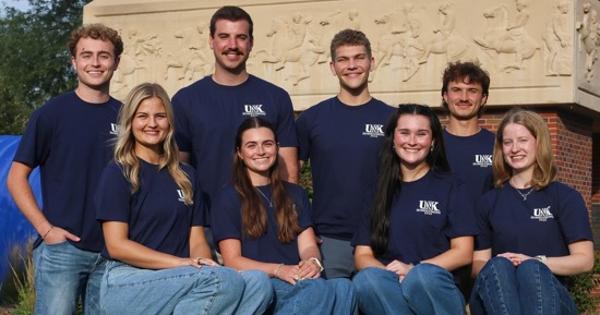 Finalists for UNK homecoming royalty are, front row from left, Kyla Kenney, Liz Lyons, Addison Chapman and Paige Oltmans; back row from left, Brodie Mitchell, Shawn Rathjen, Caleb Rother and Eli Bond. (Photo by Erika Pritchard, UNK Communications)