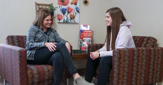 UNK student success coordinator Julie Everett, left, meets regularly with Karlie Wies and other freshmen, providing an additional level of support as they transition to college. (Photo by Erika Pritchard, UNK Communications)