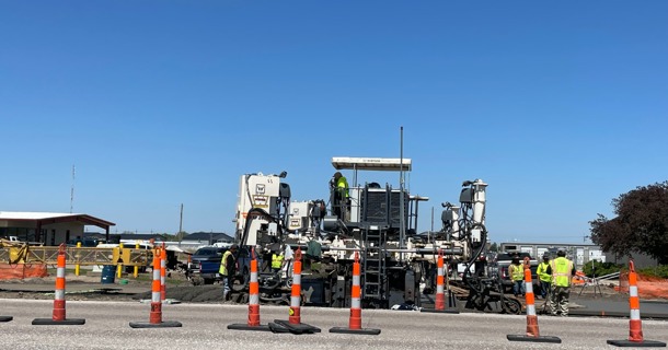 Construction workers continue concrete paving on Hwy30 between North Road and Claude Road in Grand Island.